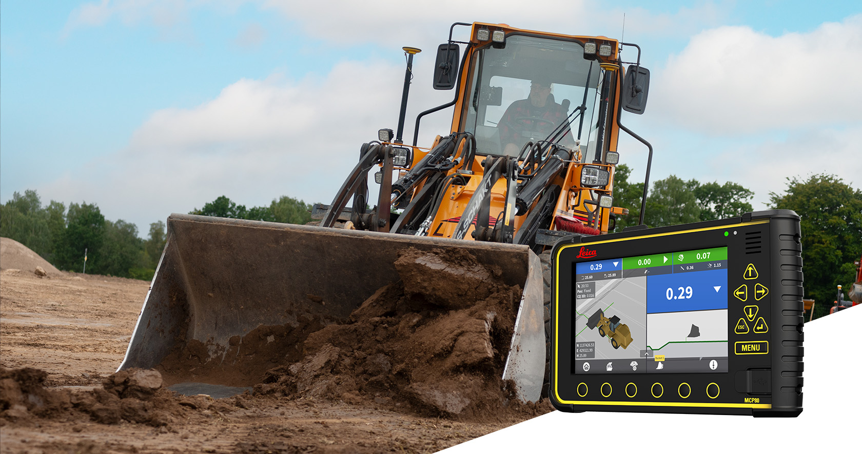 Wheel loader doing grading with Leica machine control system. 